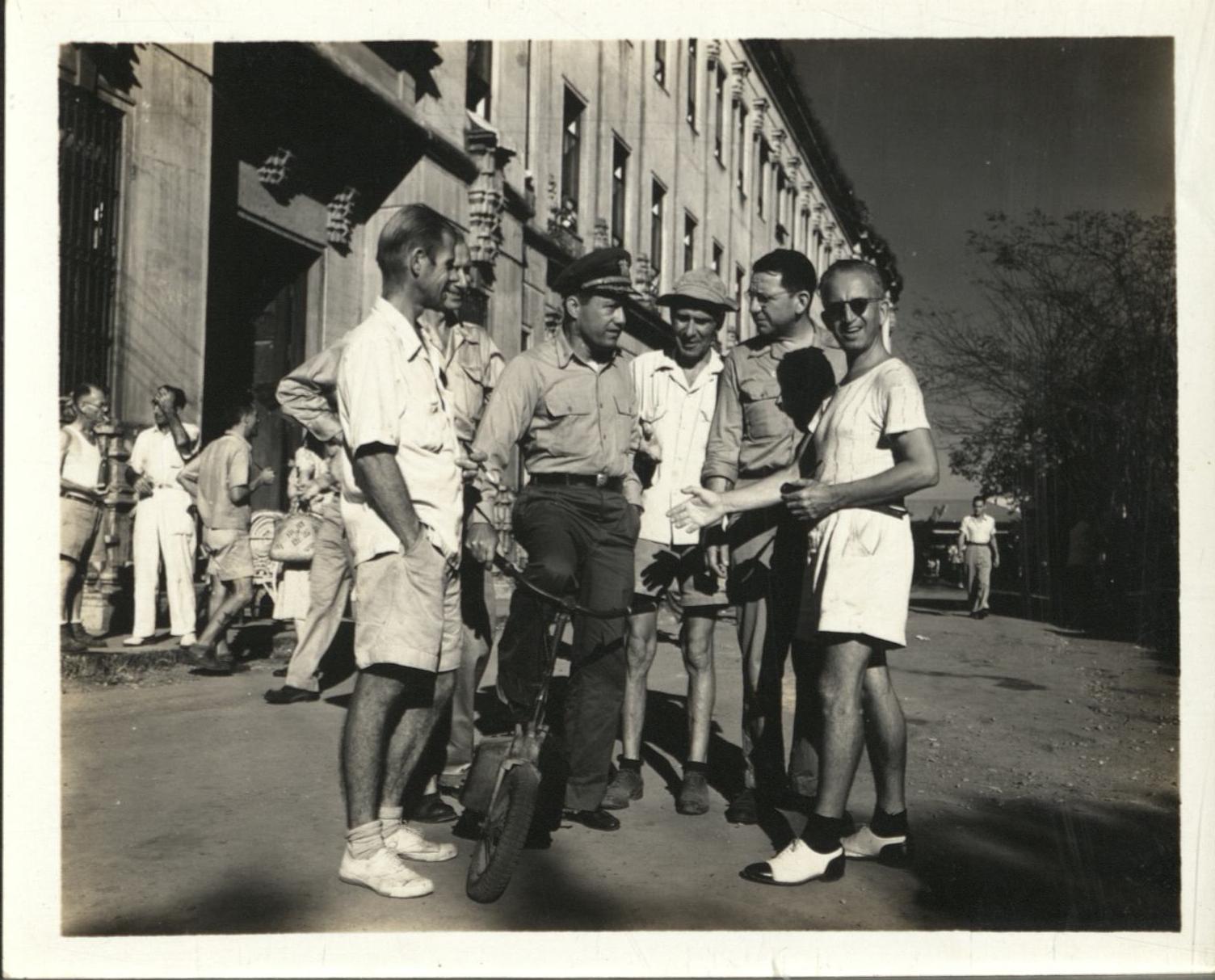 [Untitled – Freed detainees greet a U.S. officer, Santo Tomas Internment Camp].