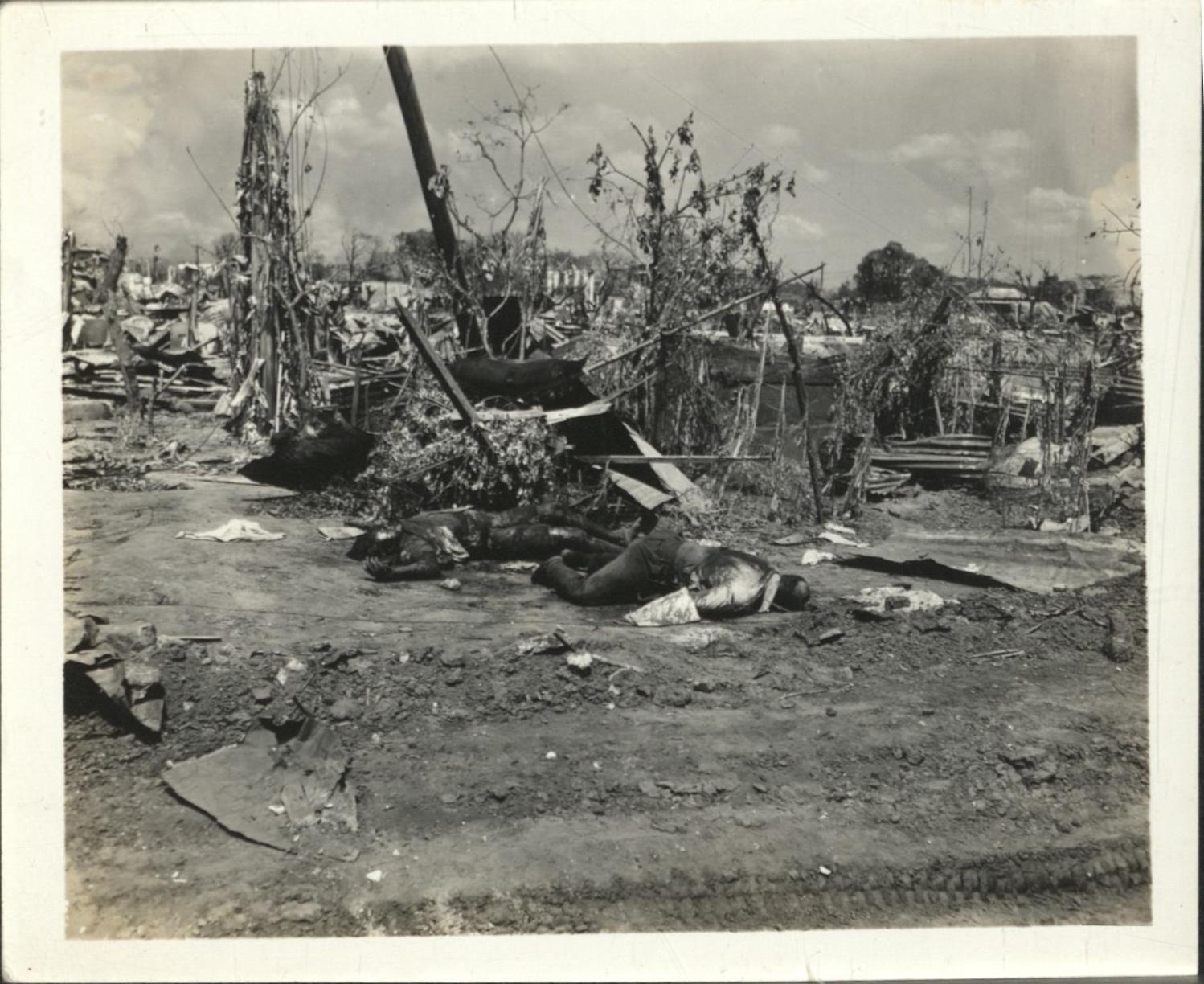 [Untitled – Destruction and dead bodies in Manila during liberation, February 1945].