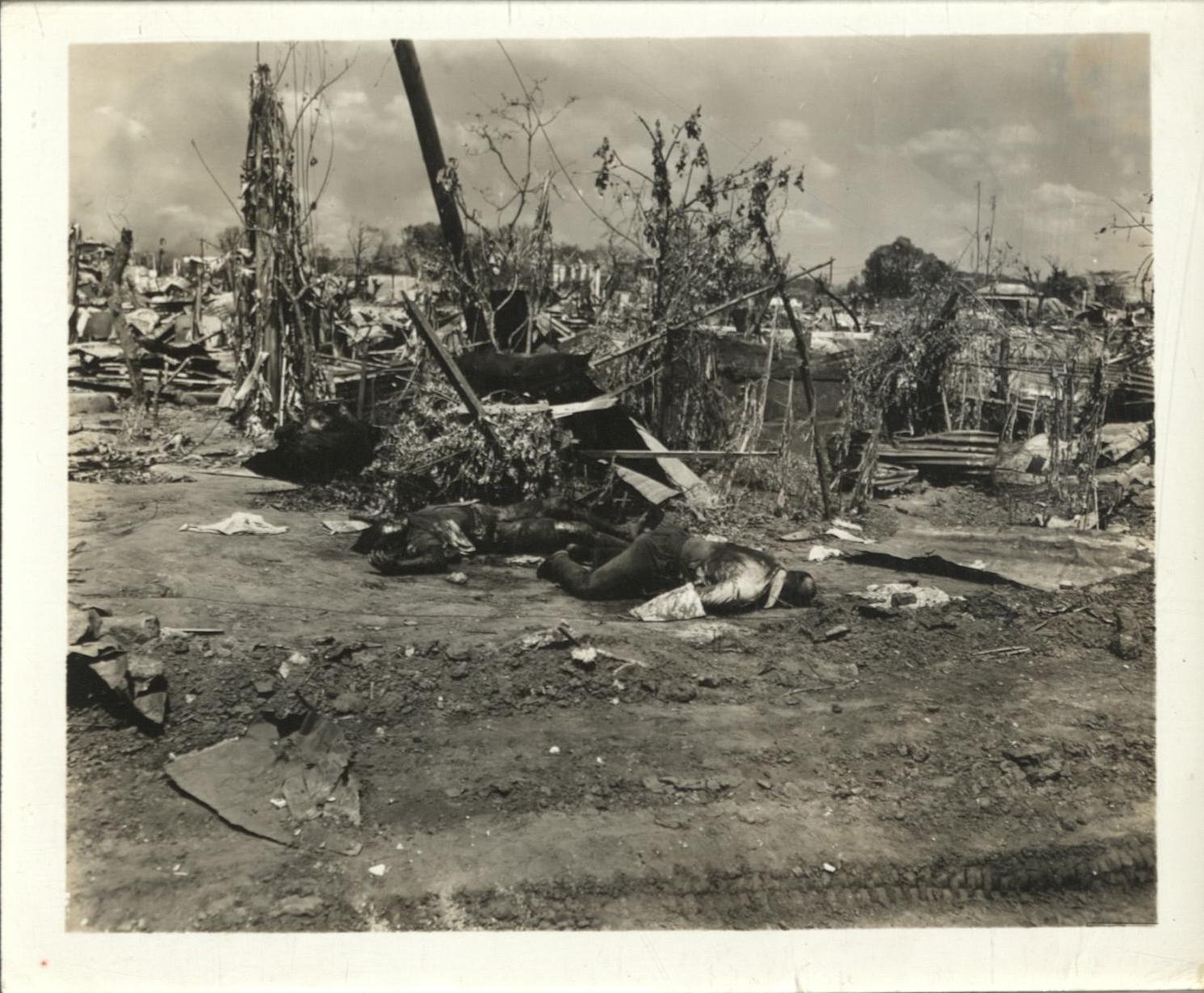 [Untitled – Destruction and dead bodies in Manila during liberation, February 1945].
