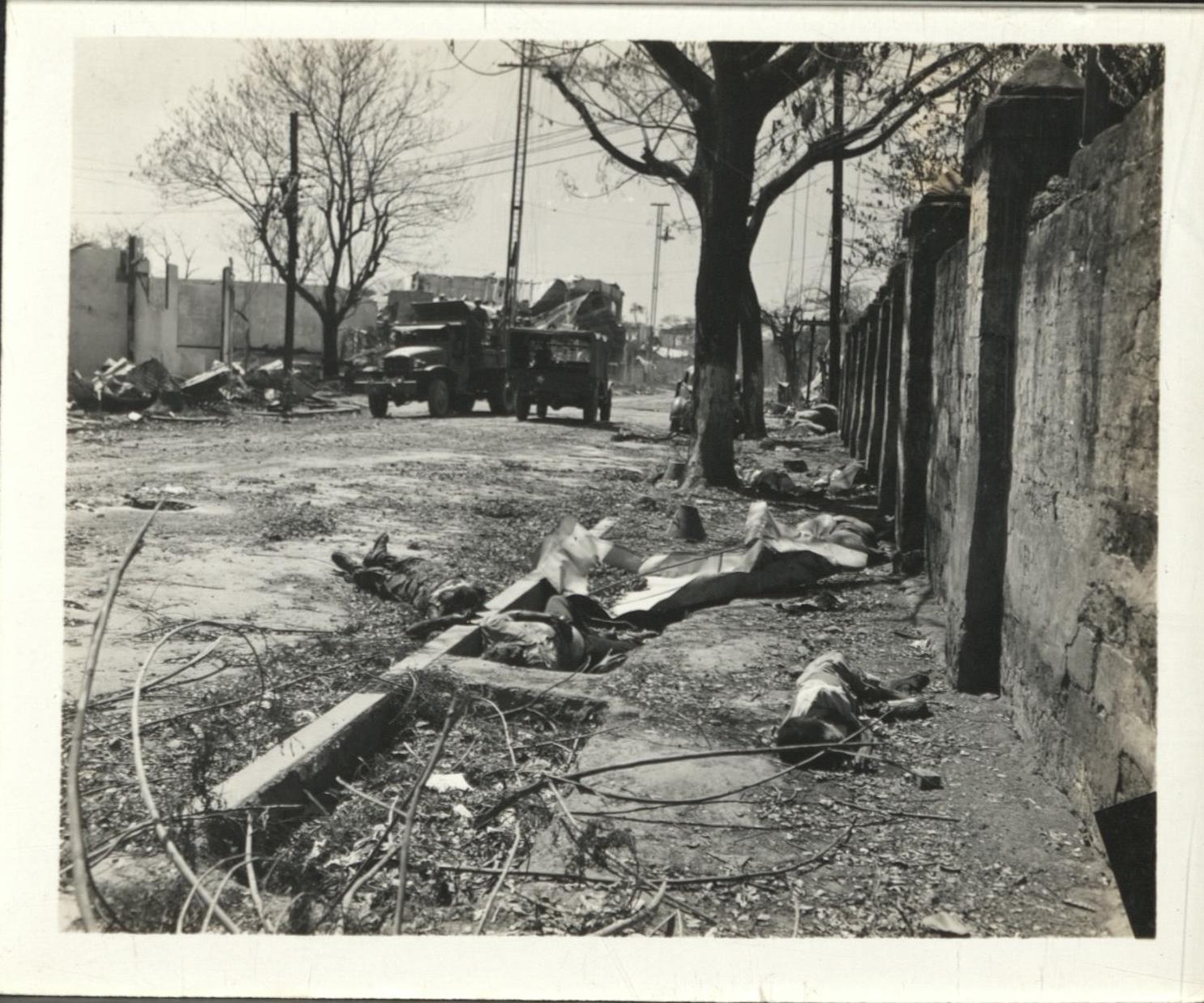 [Untitled – Destruction and dead bodies in Manila during liberation, February 1945].