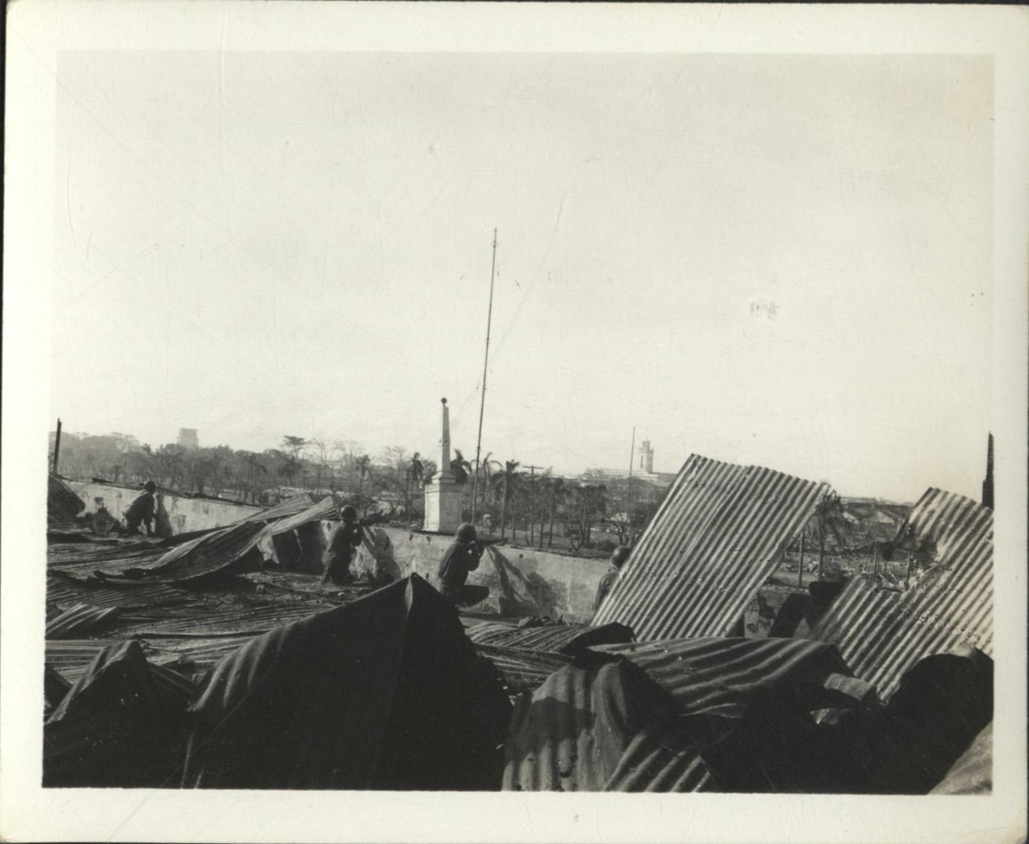 [Untitled – Urban warfare in Manila during liberation: Fighting from Fort Santiago past Anda Monument to the Port District, February 1945].