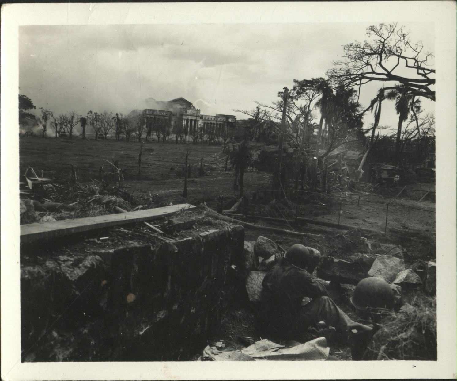 [Untitled – Destruction in Manila during liberation: Artillery shelling City Hall and the Legislative Building, February 1945].