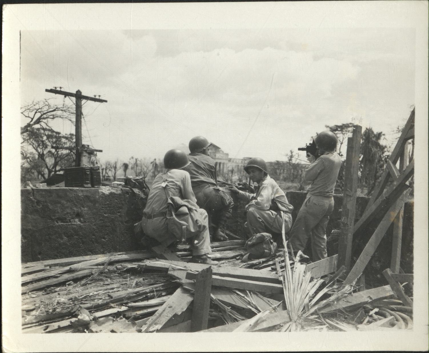 [Untitled – Destruction in Manila during liberation: Artillery shelling City Hall and the Legislative Building, February 1945].