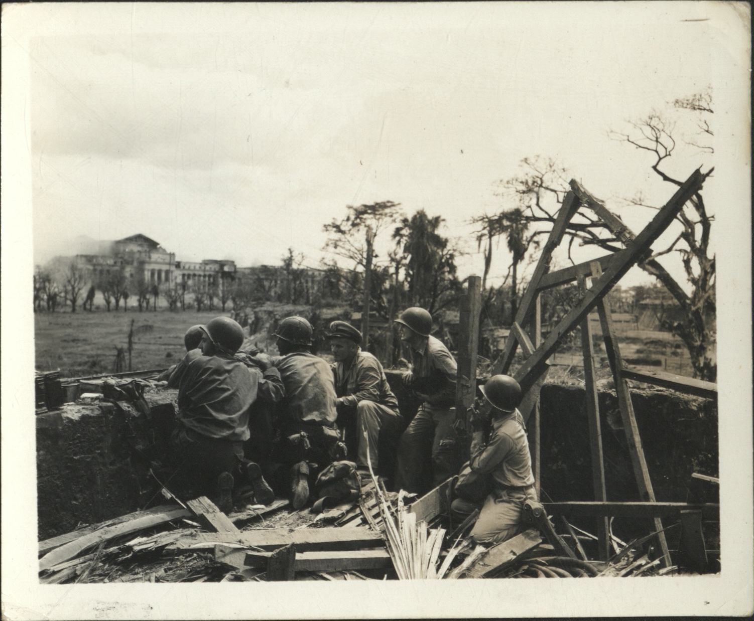 [Untitled – Destruction in Manila during liberation: Artillery shelling City Hall and the Legislative Building, February 1945].
