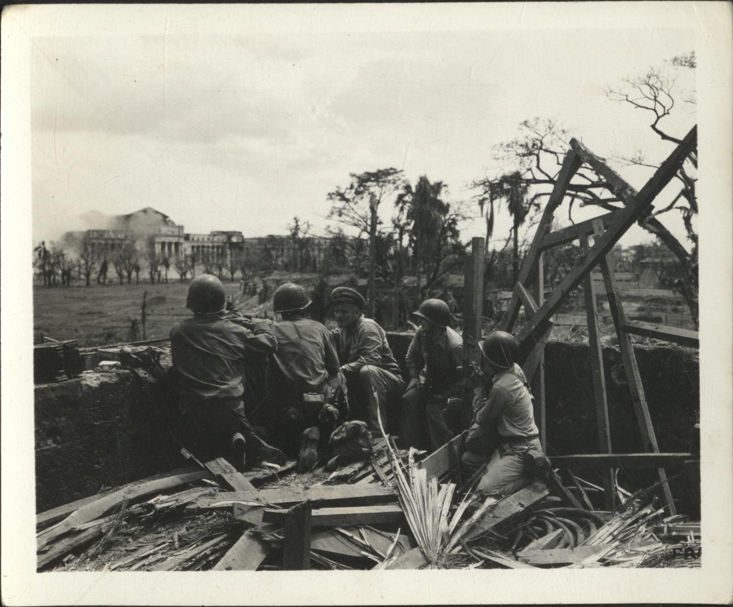 [Untitled – Destruction in Manila during liberation: Artillery shelling City Hall and the Legislative Building, February 1945].
