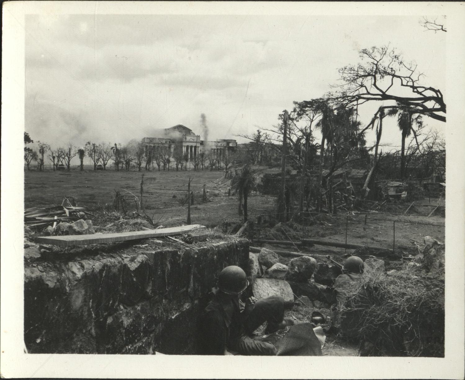 [Untitled – Destruction in Manila during liberation: Artillery shelling City Hall and the Legislative Building, February 1945].