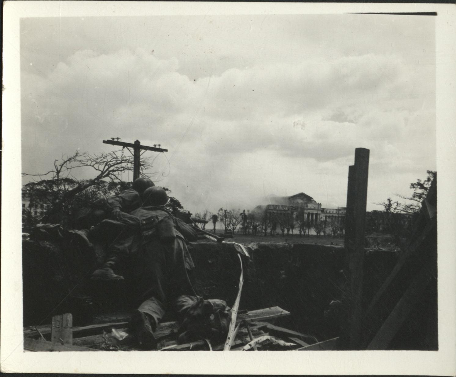 [Untitled – Destruction in Manila during liberation: Artillery shelling City Hall and the Legislative Building, February 1945].