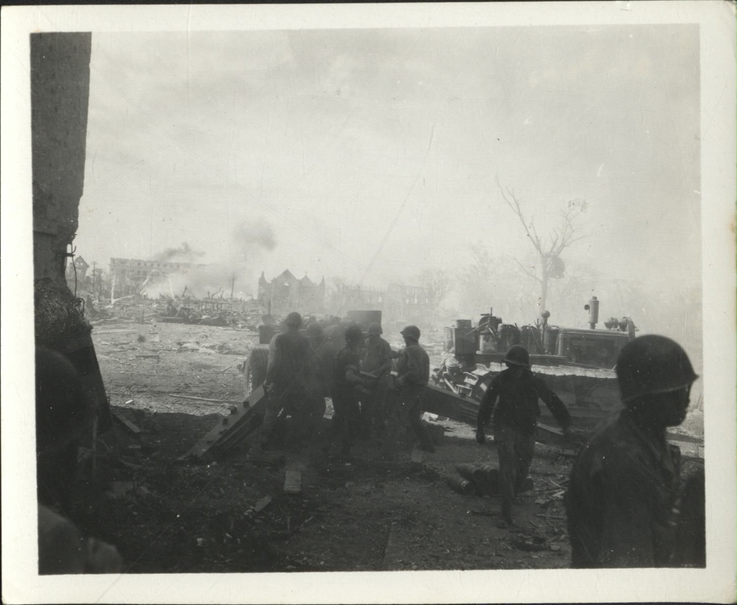 [Untitled – Destruction in Manila during liberation: Artillery firing from Legislative Building (?) toward Ermita and Central Methodist Church, February 1945].