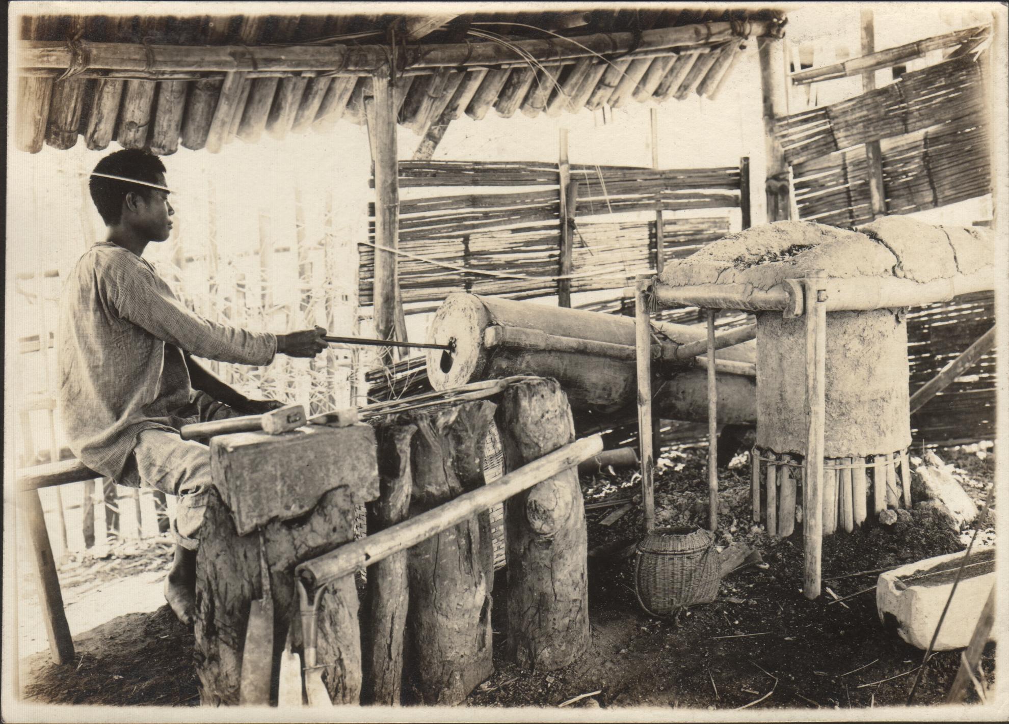 A blacksmith shop showing how to use the furnace at San Nicolas, Ilocos Norte.