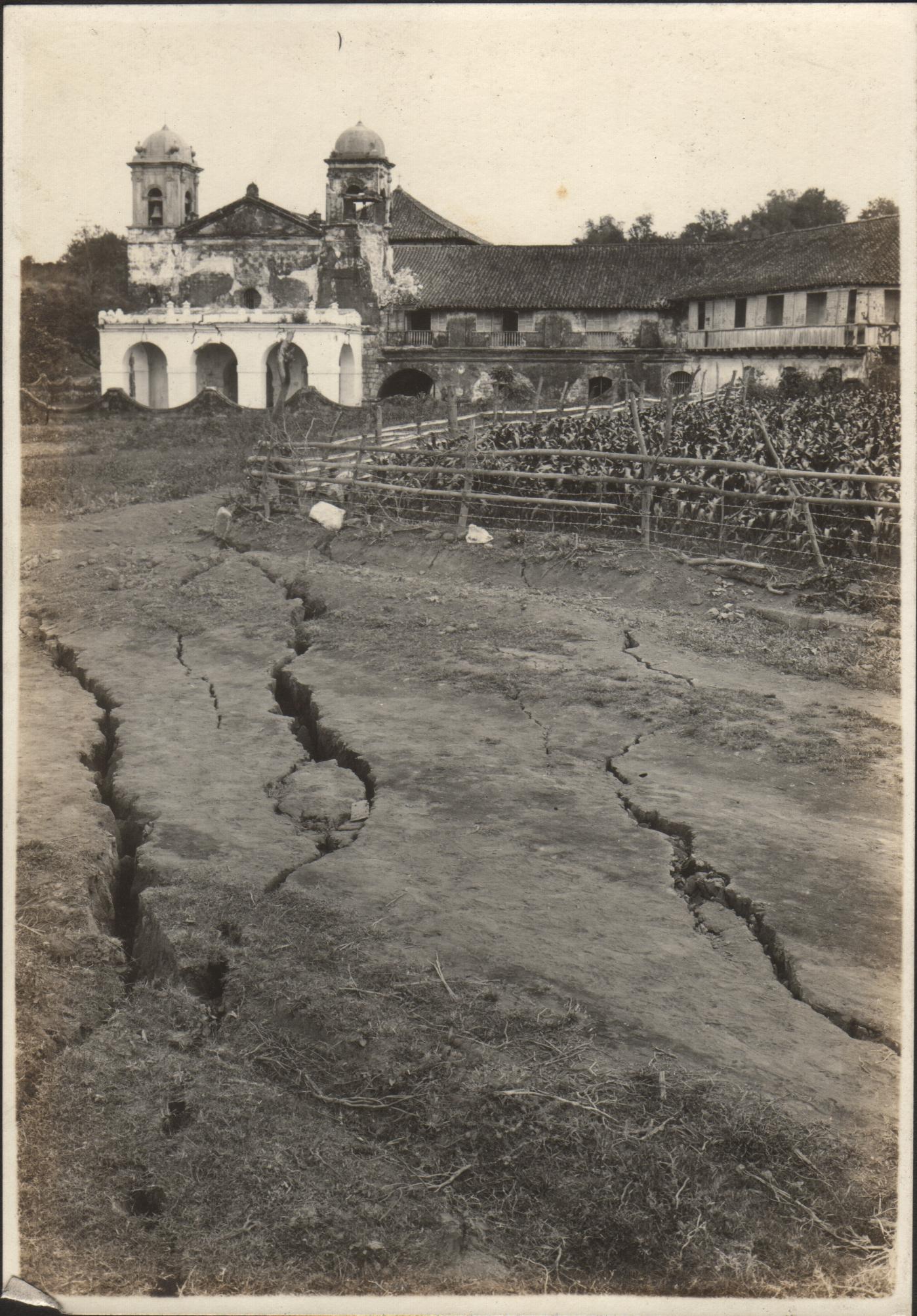 [Untitled – Earthquake fault in road by Taal Church].