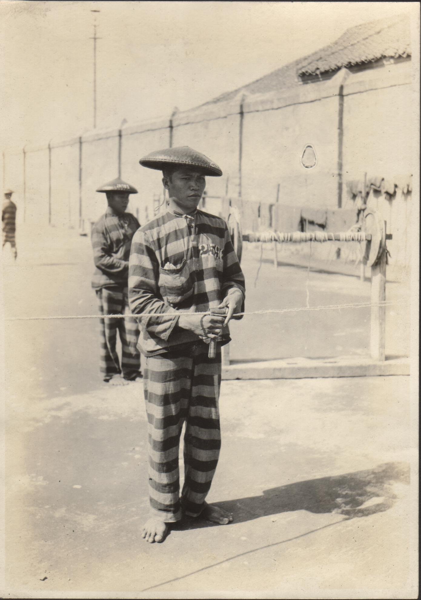 Prisoners making hemp rope.