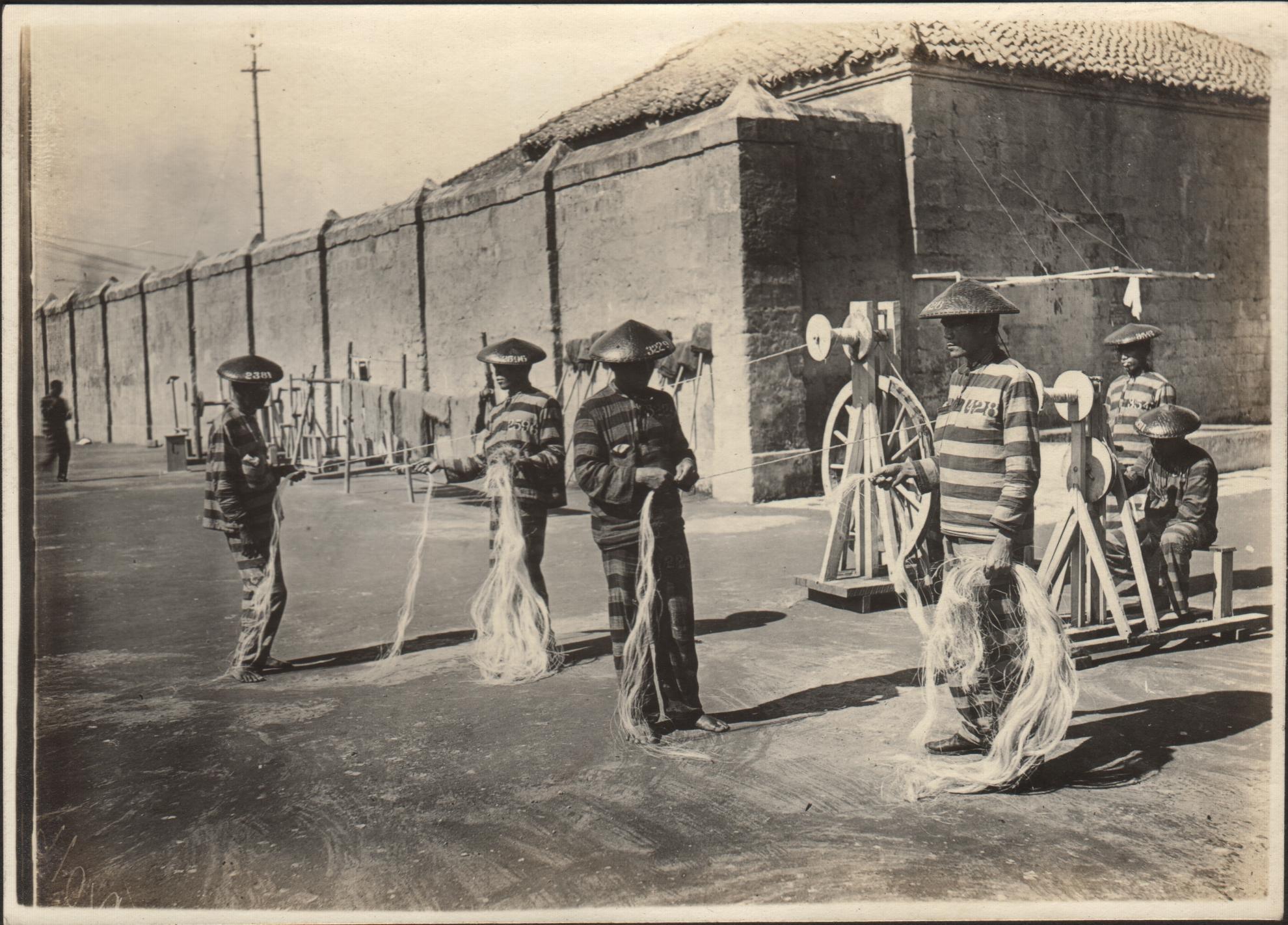 Prisoners making hemp rope.