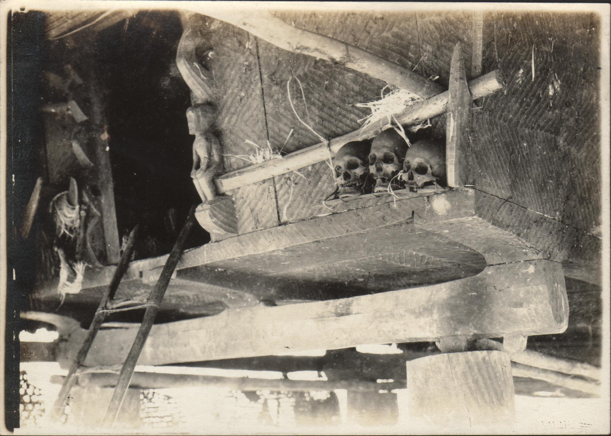 Heads of enemies placed as ornaments on the house of the murderer.