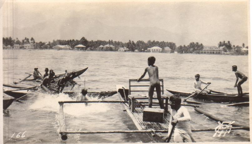 166. {Untitled – Children swimming and playing with bancas].