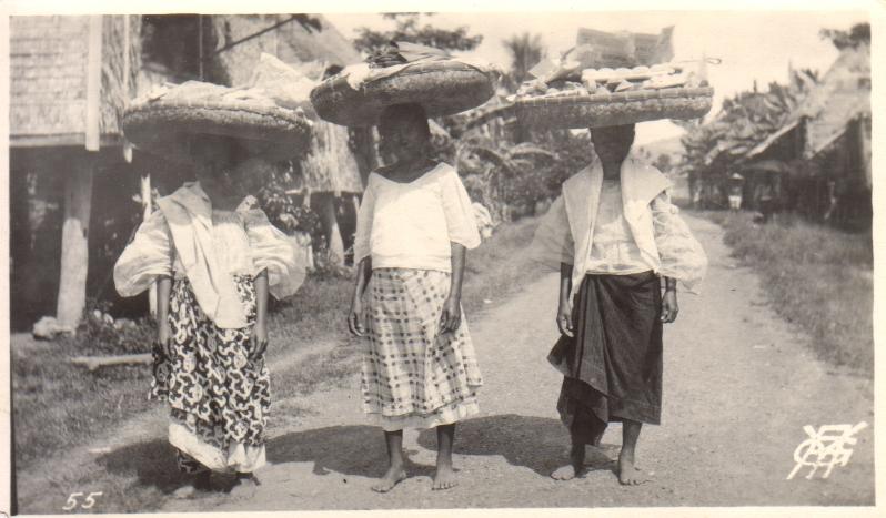 55. [Untitled – Three Filipinas carrying big head baskets].
