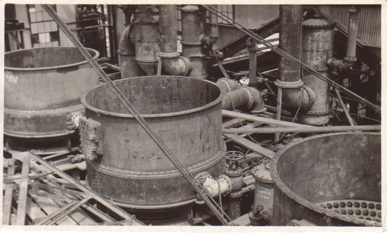 [Untitled – Boiling pots and piping at a sugar central. Negros Island?].