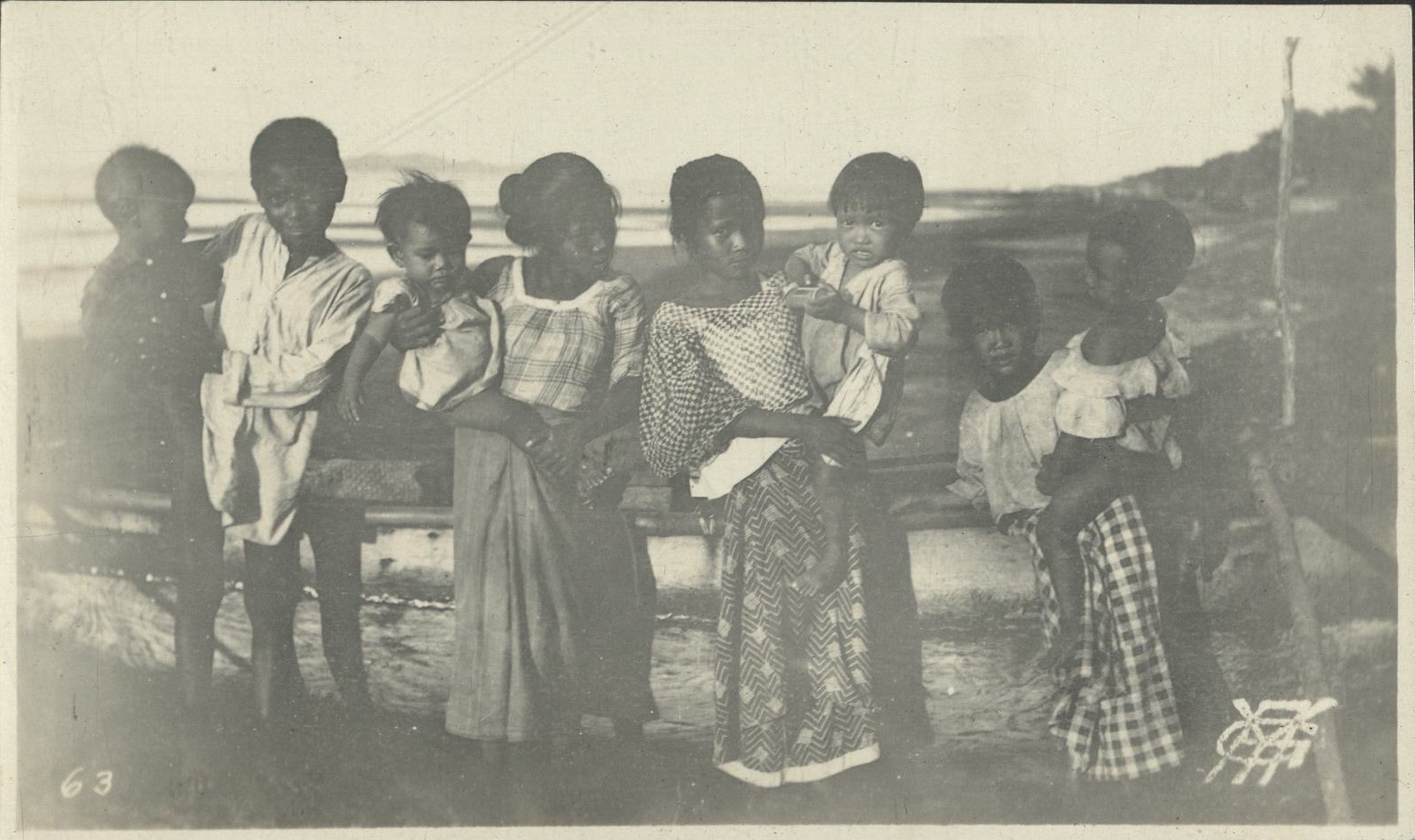 63. [Untitled – Group of Filipino children at the seashore].