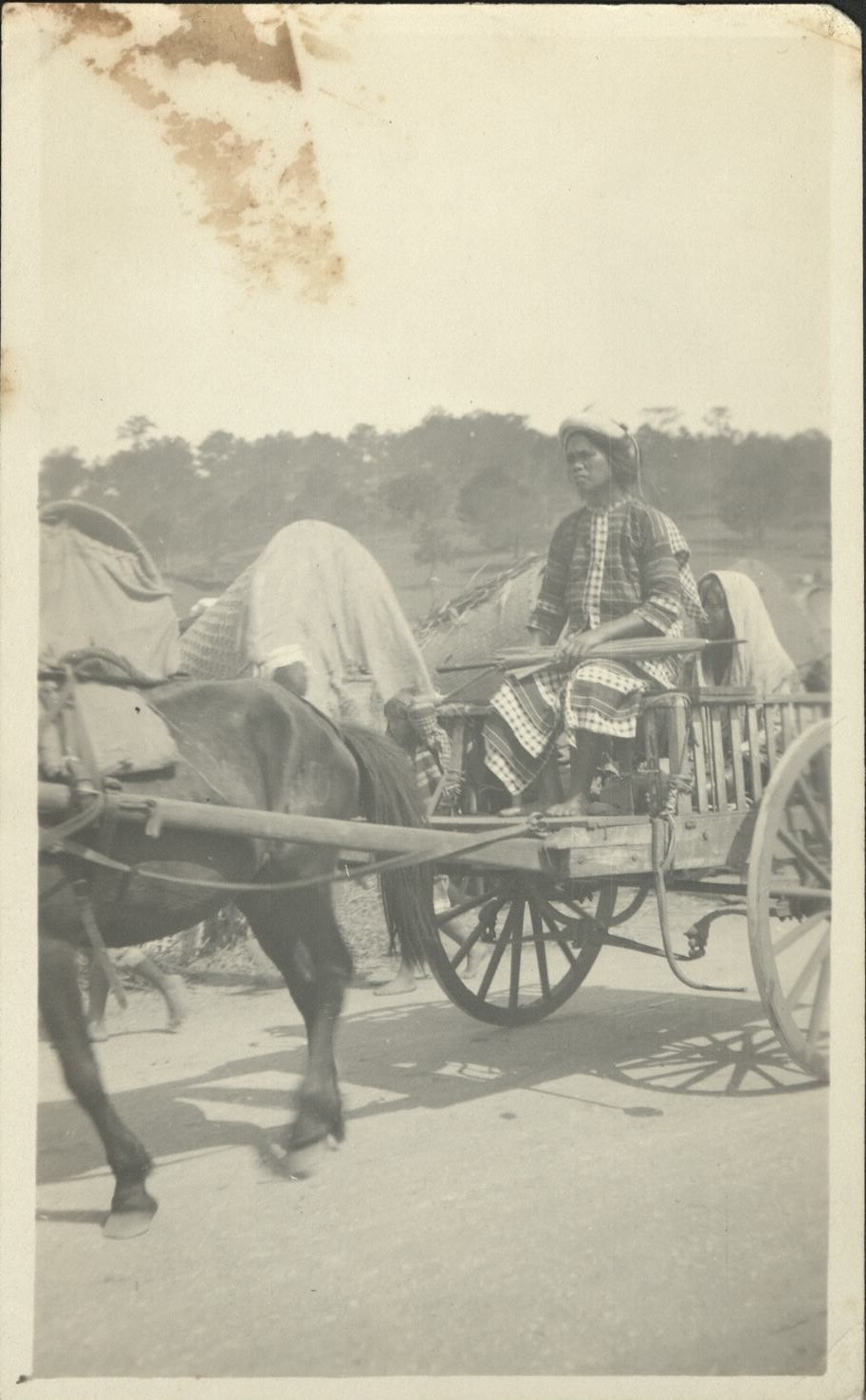 [Untitled – Igorot man & family in horse-drawn cart, Baguio]