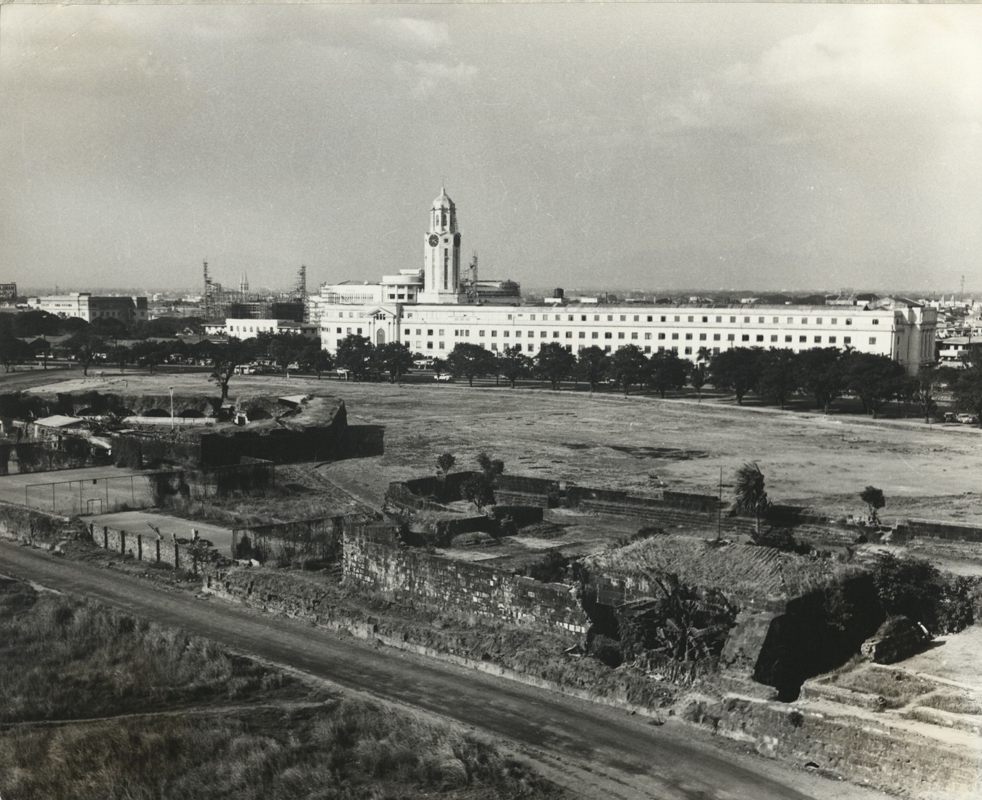 PHILIPPINES: Walls of Intramuros and City Hall, Manila.