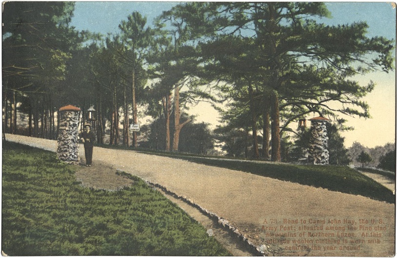 A 73 ï¿½ Road to Camp John Hay, the U.S. Army Post; situated among the Pine clad mountains of Northern Luzon. At this altitude woolen clothing is worn with comfort the year around.
