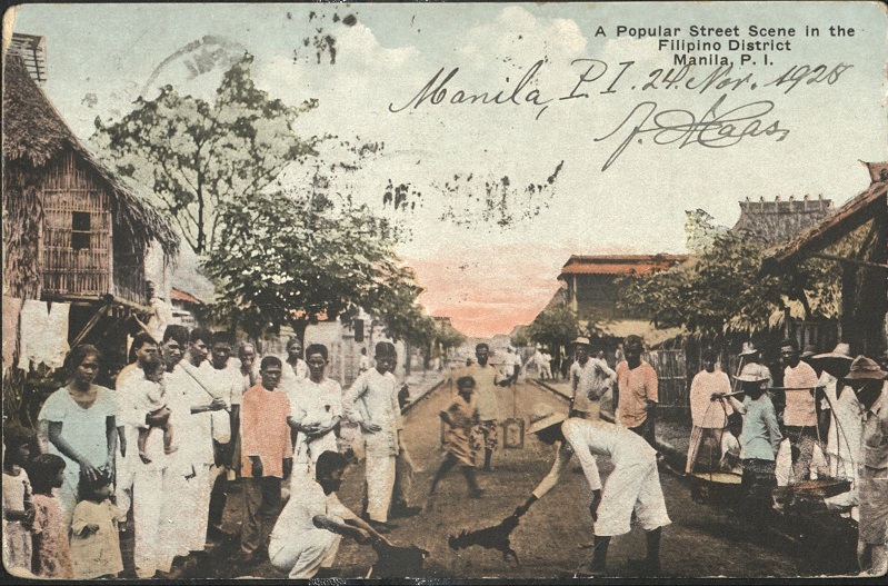A popular street scene in the Filipino district, Manila, P. I.