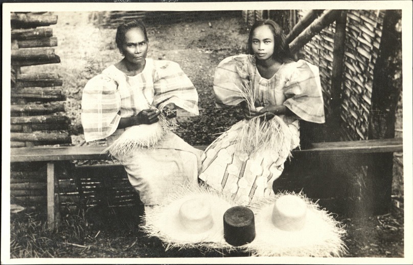 [Untitled ï¿½ Two women weaving hats].