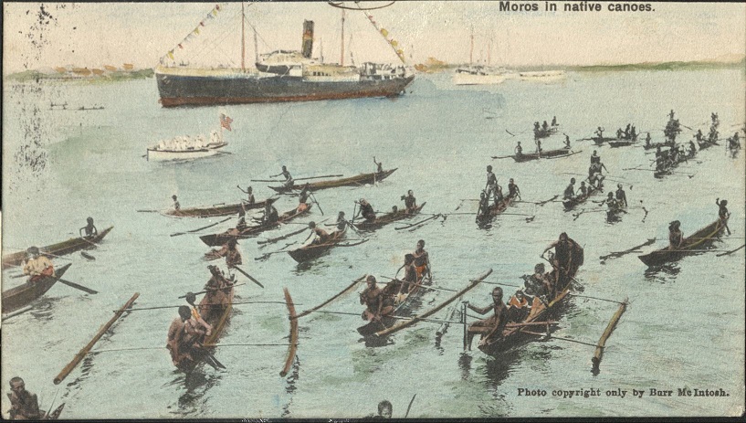 �IN THE PHILIPPINES�. Moros in native canoes.