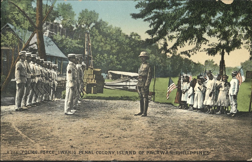 A 184 � Reviewing Colonists on the Plaza at Iwahig Penal Colony, Island of Palawan, Philippines.