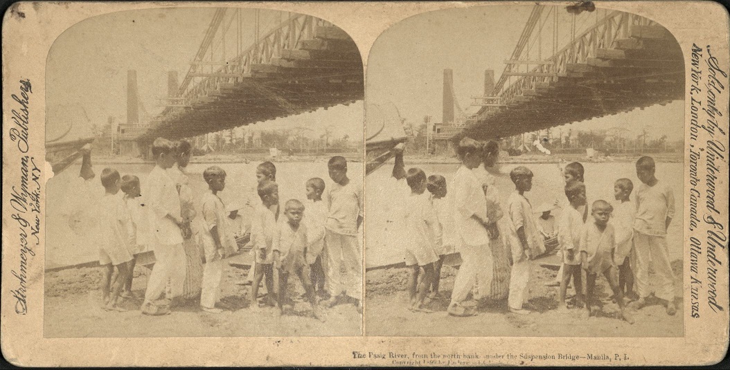 The Pasig River, from the north bank – under the Suspension Bridge – Manila, P. I.