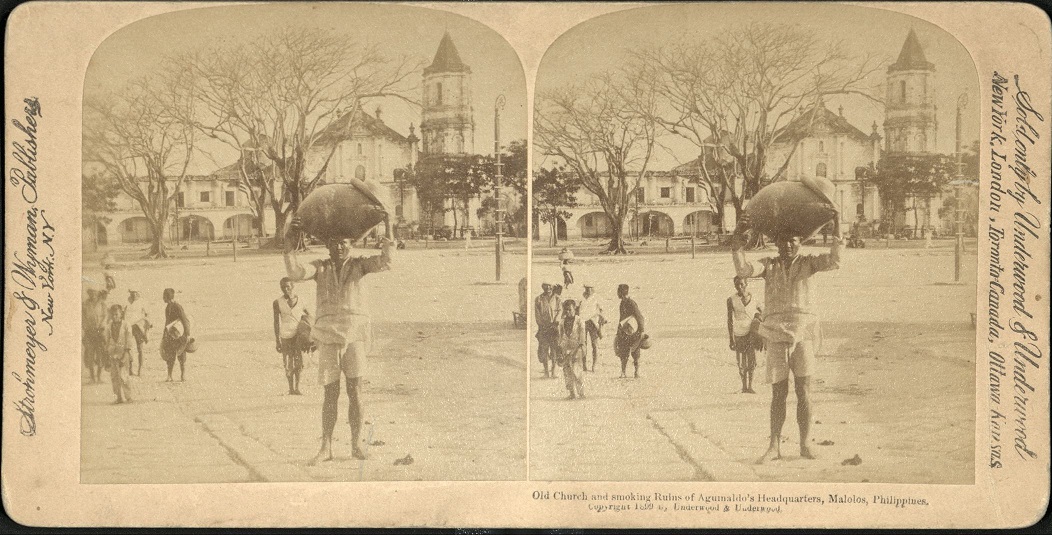Old Church and smoking Ruins of Aguinaldo’s Headquarters, Malolos, Philippines.