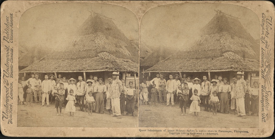 Queer Inhabitants of queer Houses – before a native store in Paran?aque, Philippines.