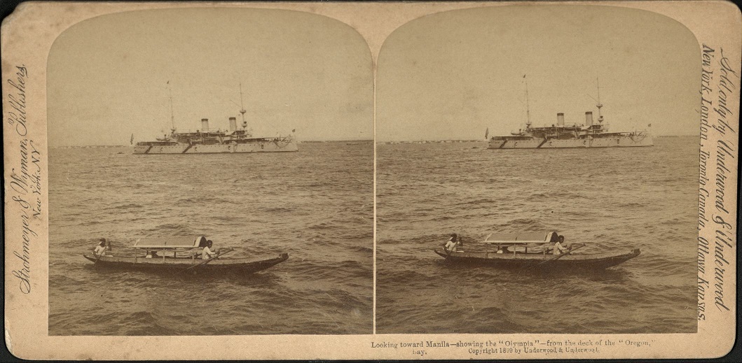 Looking toward Manila – showing the “Olympia ” from the deck of the “Oregon,” Manila Bay.