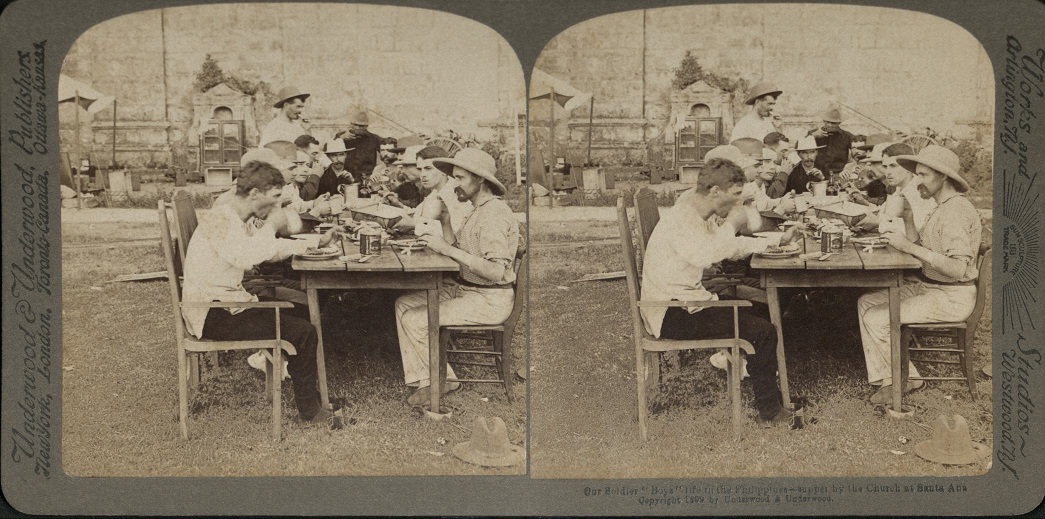 Our Soldier “Boys” life in the Philippines – supper by the Church at Santa Ana.