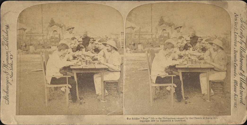 Our Soldier “Boys” life in the Philippines – supper by the Church at Santa Ana.