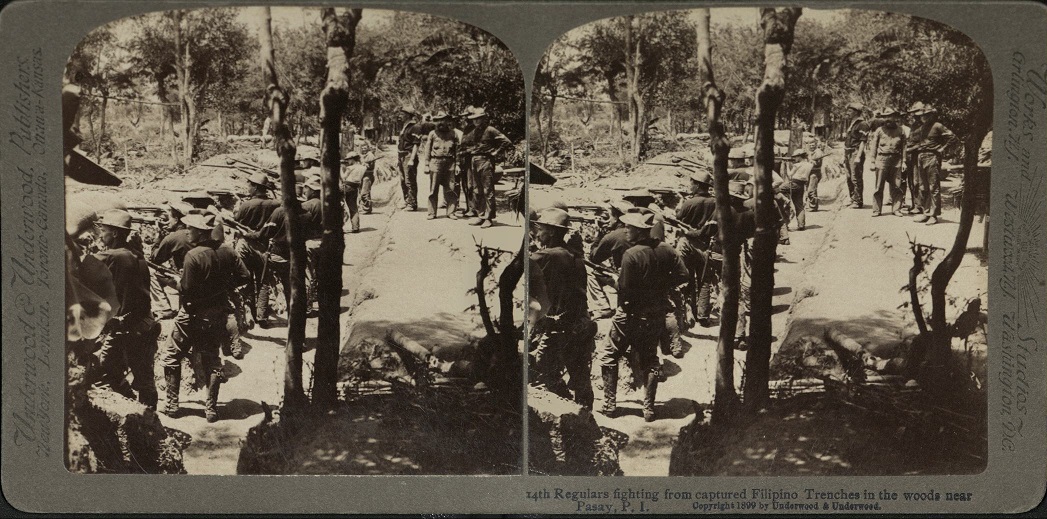 14th Regulars fighting from captured Filipino Trenches in the woods near Pasay, P. I.