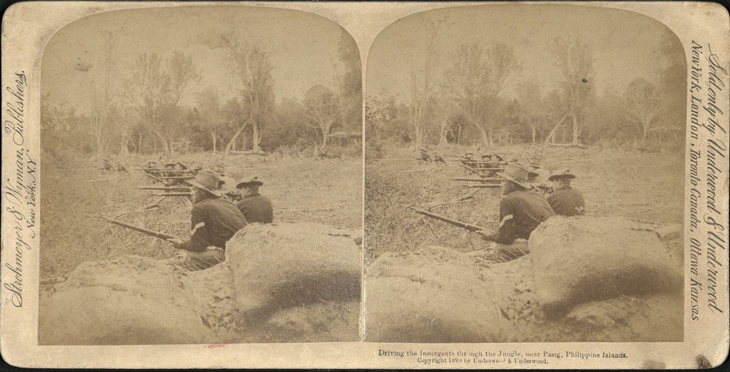 Driving the Insurgents through the Jungle, near Pasig, Philippine Islands.