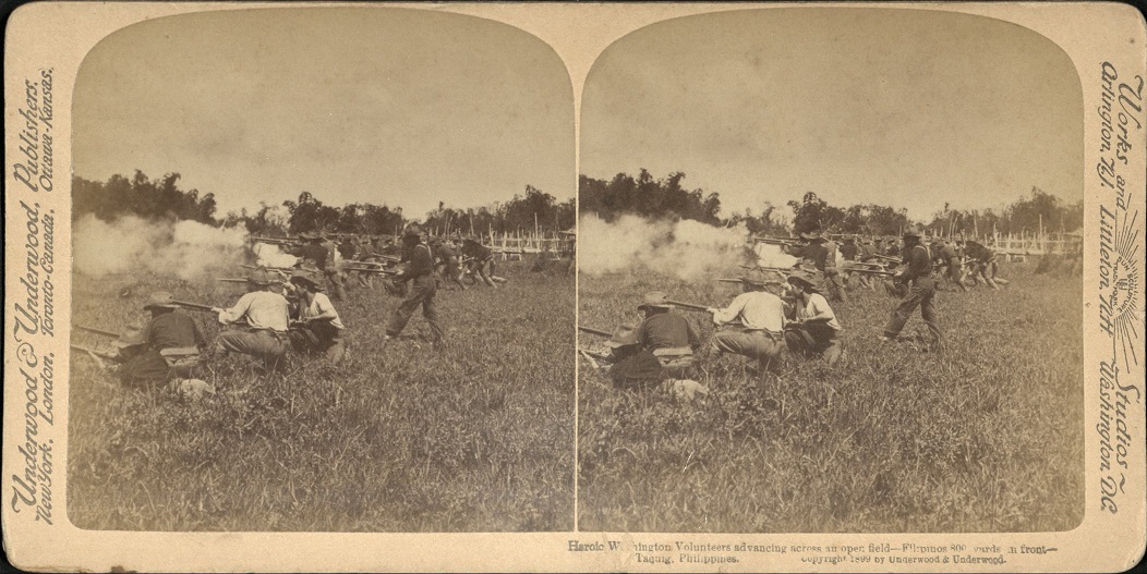 Heroic Washington Volunteers advancing  across an open field – Filipinos 800 yards in front – Taquig [Taguig], Philippines.