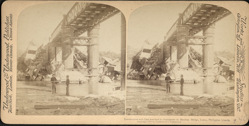 Locomotives and Cars wrecked by Insurgents at Bamban Bridge, Luzon, Philippine Islands.