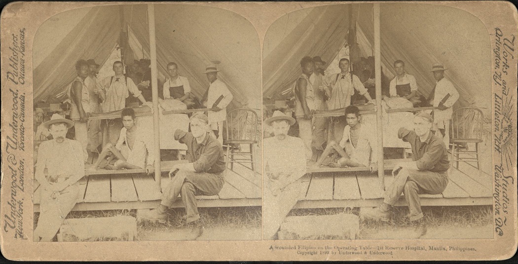 A wounded Filipino on the Operating Table – 1st Reserve Hospital, Manila, Philippines.