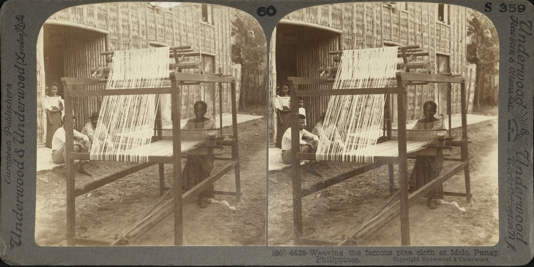 Weaving the famous pina cloth at Molo, Panay, Philippines.