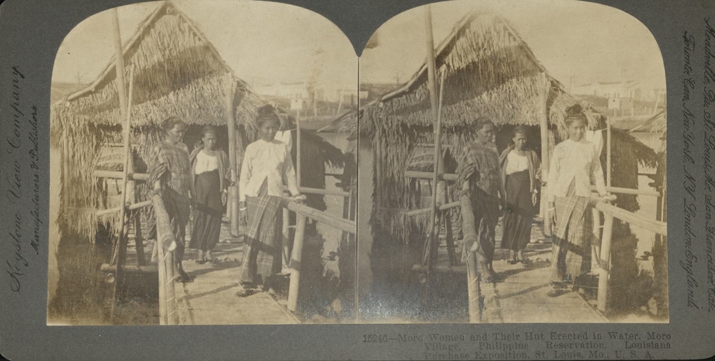 Moro Women and Their Hut Erected in Water, Moro Village, Philippine Reservation, Louisiana Purchase Exposition, St. Louis, Mo., U.S.A.