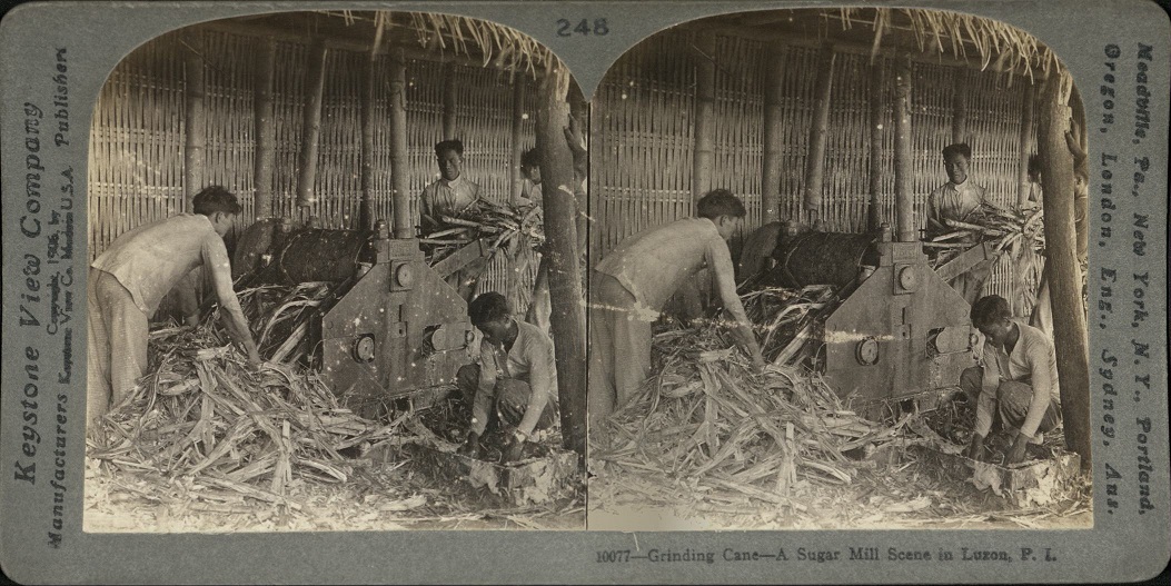 Grinding Cane – A Sugar Mill Scene in Luzon, P. I.