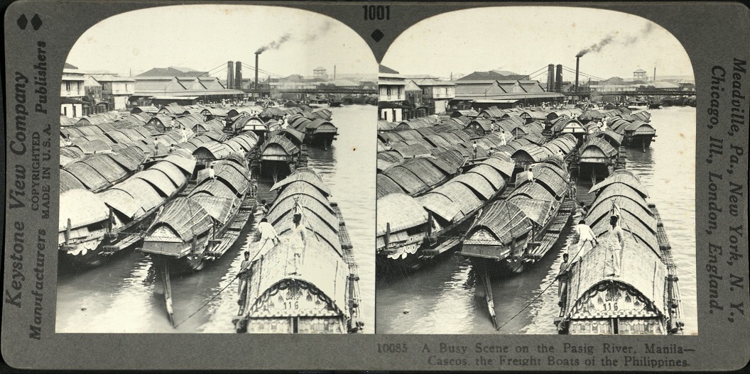 A Busy Scene on the Pasig River, Manila – Cascos, the Freight Boats of the Philippines.