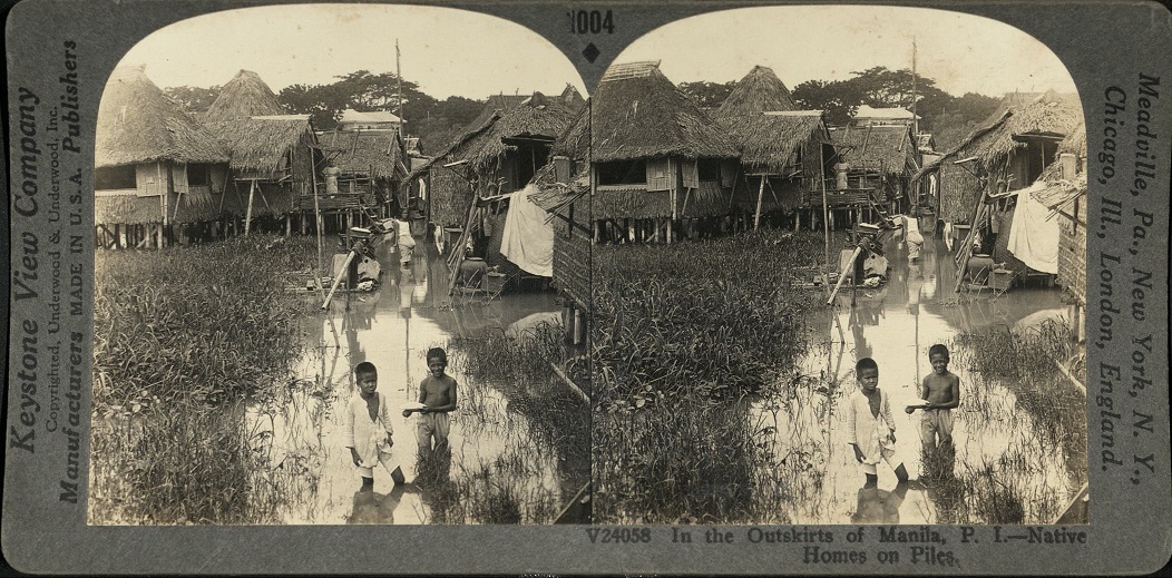 In the Outskirts of Manila, P. I. – Native Homes on Piles.