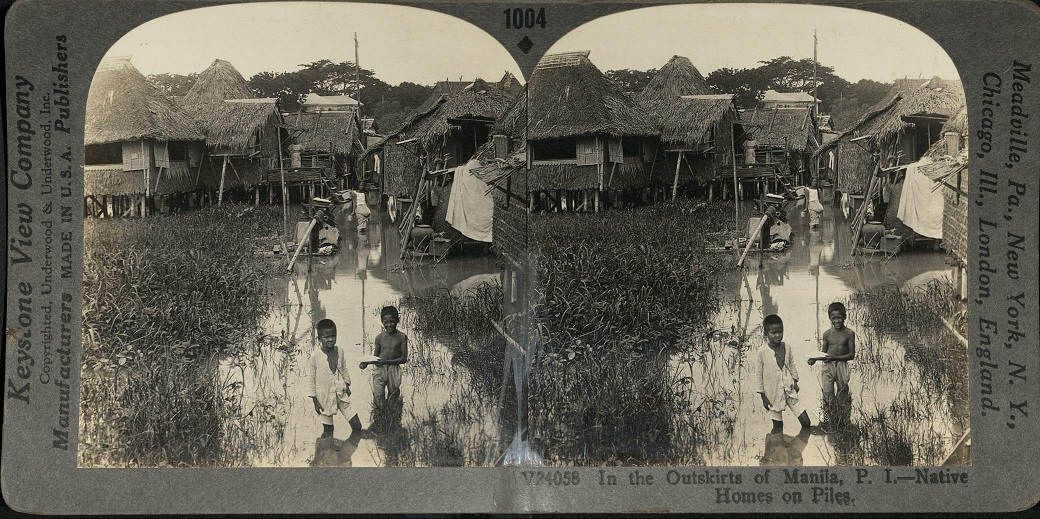 In the Outskirts of Manila, P. I. – Native Homes on Piles.